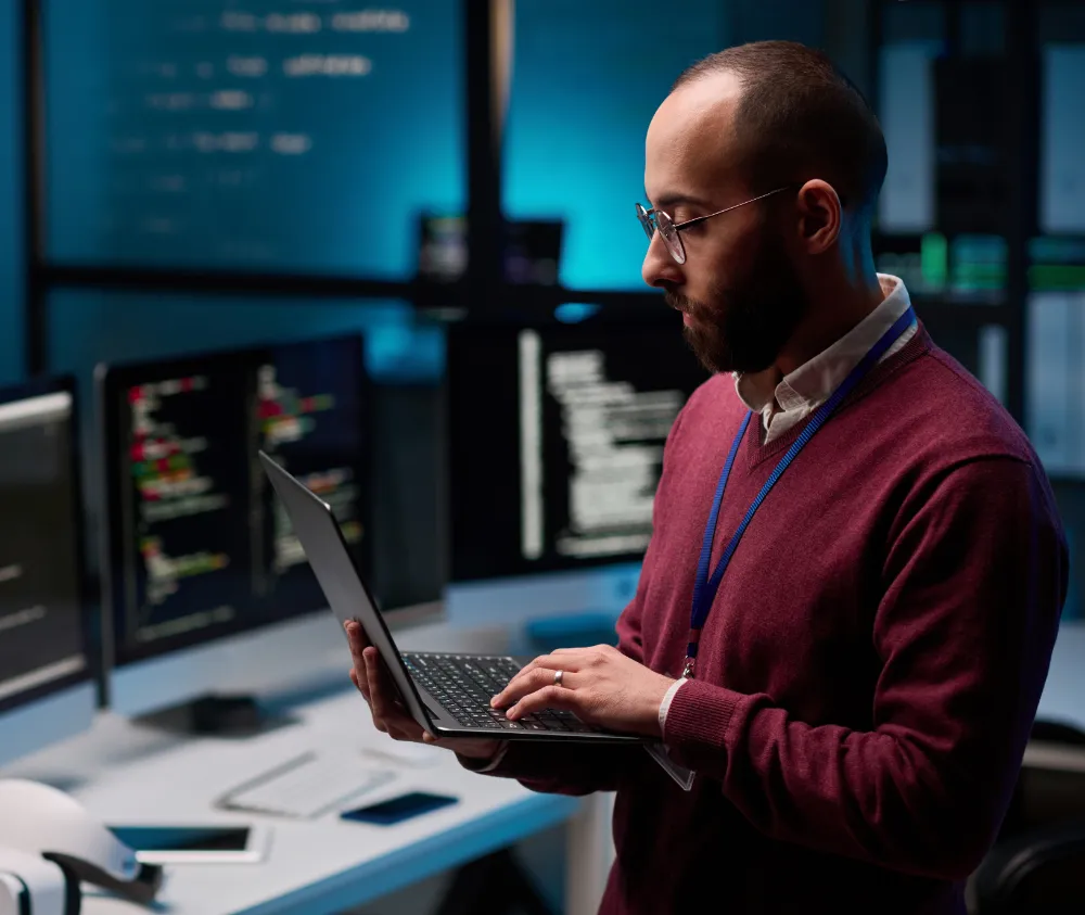 Man working on laptop in office